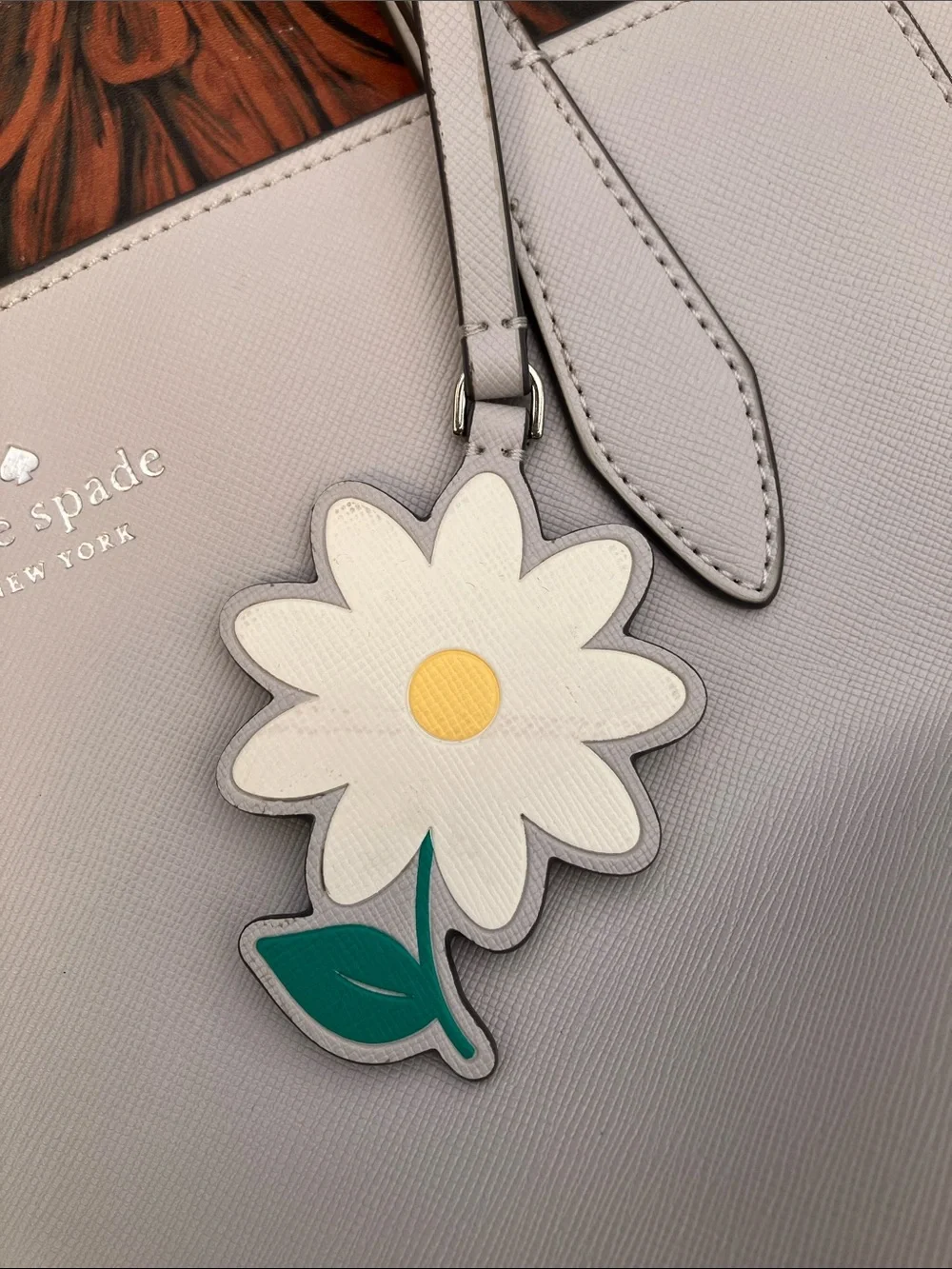 kate spade light gray Dana leather tote with daisy charm